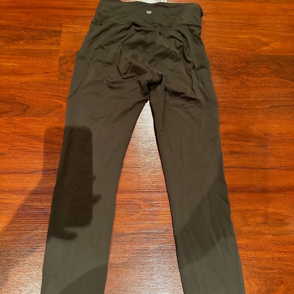 LULULEMON 25” DARK OLIVE FAST AND FREE HIGH RISE TIGHT SIZE 4 NEW CONDITION